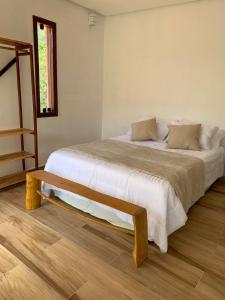 Ein Bett oder Betten in einem Zimmer der Unterkunft Pousada Canto das Cachoeiras