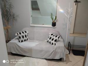 Posteľ alebo postele v izbe v ubytovaní Apartament przy Słonecznej