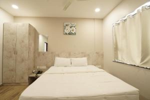 Katil atau katil-katil dalam bilik di HOTEL TRP BLISS