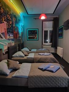 Postel nebo postele na pokoji v ubytování Hotel Cade