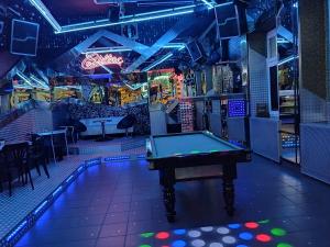 a pool table in a gaming room with a pool table at Hotel Cade in Písek