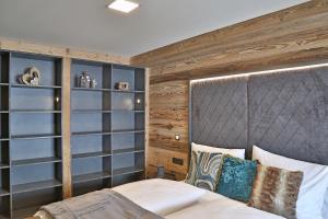 Voodi või voodid majutusasutuse Sieglhub Chalets - Appartements - Hotel toas