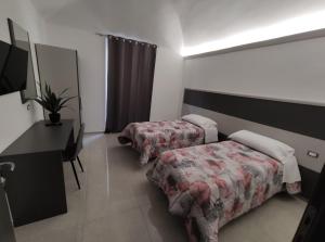 Tempat tidur dalam kamar di Novara