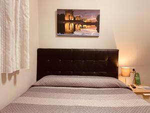 Postel nebo postele na pokoji v ubytování Hostal Patria Madrid