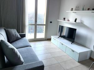 A television and/or entertainment centre at Sun Lake Iseo apartment