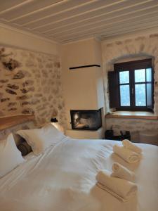 Кровать или кровати в номере Casagli Luxury Suites