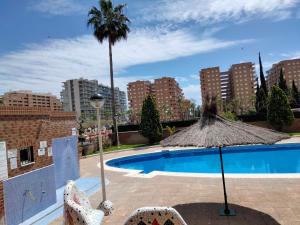 The swimming pool at or close to ACV- Costa Marfil II-2ª linea planta 6 frontal