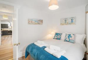 Voodi või voodid majutusasutuse Harbour Steps toas