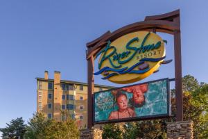 a sign for the new disney springs resort at RiverStone Condo Resort & Spa in Pigeon Forge