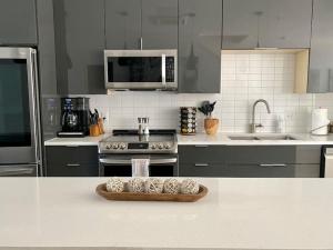 a kitchen with a tray of eggs on a counter at Walk to Downtown UT Sports Famous Dining and abundant Nightlife from this Luxury Condo w 3 restaurants in the complex in Austin