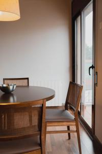 Posedenie v ubytovaní Can Morera Apartaments a Les Preses