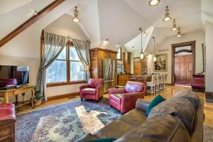 a living room with a couch and chairs at Historic Guest House on Castle Kimble Estate! in Manhattan