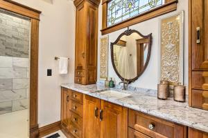 a bathroom with a sink and a mirror at Historic Guest House on Castle Kimble Estate! in Manhattan +22 photos