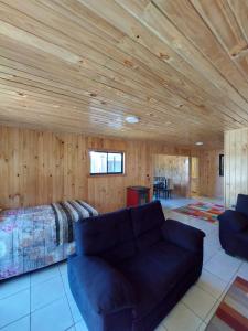 Istumisnurk majutusasutuses Cabaña Loft Curaco de Vélez