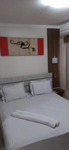 Postel nebo postele na pokoji v ubytování Caldas Novas Lacqua Diroma