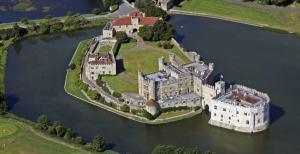 an aerial view of a castle on a lake at Moleside Cottage in Marden