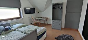 Ένα ή περισσότερα κρεβάτια σε δωμάτιο στο Ferienwohnung S+F Bokermann