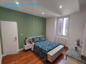 Posteľ alebo postele v izbe v ubytovaní Appartements - Halles Brauhauban Tarbes