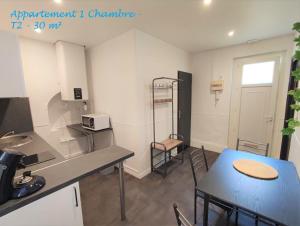 Kuchyňa alebo kuchynka v ubytovaní Appartements - Halles Brauhauban Tarbes