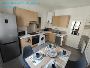 Kuchyňa alebo kuchynka v ubytovaní Appartements - Halles Brauhauban Tarbes