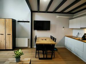 Kuchyňa alebo kuchynka v ubytovaní Hugo VIP Apartments
