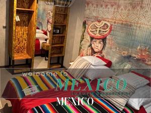 a sign that says welcome to mexico in a bedroom at Global Home - Aparthotel - No Contact Check In in Mielec
