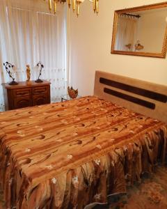 Ein Bett oder Betten in einem Zimmer der Unterkunft Apartman stan na dan Sarajevo
