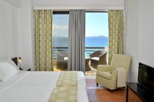 Postel nebo postele na pokoji v ubytování Limira Mare Hotel