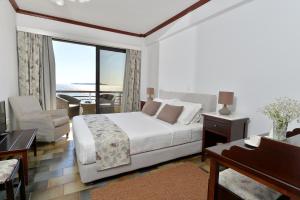 Postel nebo postele na pokoji v ubytování Limira Mare Hotel