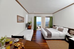 Postel nebo postele na pokoji v ubytování Limira Mare Hotel
