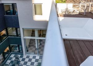 a view from the top of a building with a balcony at Fliphaus Santa Fe 5100 - 3 Bd Pool & Bbq in Buenos Aires