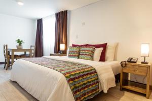 Postel nebo postele na pokoji v ubytování Hotel Carretero