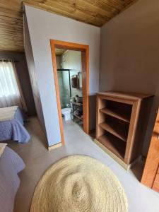 Cama ou camas em um quarto em Refúgio dos Coiotes