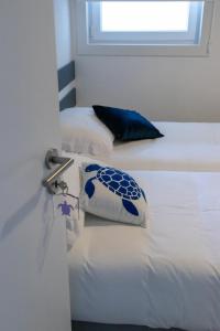Postel nebo postele na pokoji v ubytování Perto do Mar, Alojamento Local