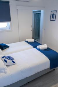 Postel nebo postele na pokoji v ubytování Perto do Mar, Alojamento Local