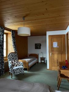 Postel nebo postele na pokoji v ubytování Auberge de l'Ange