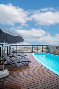 The swimming pool at or close to Aruá Pousada Boutique