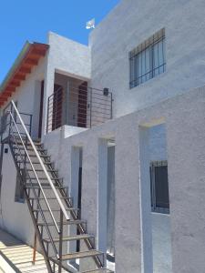 a staircase on the side of a building at Departamento 2448 in Mina Clavero