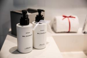two bottles of hair products sitting on a counter at InterContinental Cascais-Estoril by IHG in Estoril