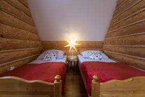Posteľ alebo postele v izbe v ubytovaní Zakopane - Króle 16