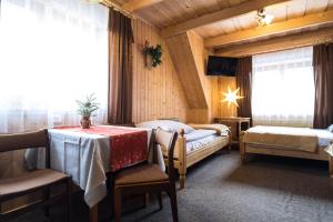 Posteľ alebo postele v izbe v ubytovaní Zakopane - Króle 16