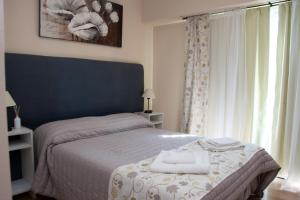Postel nebo postele na pokoji v ubytování Paseo Bolivar Hotel