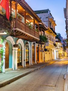 a street in an old town at night at Hotel Casona del Porvenir in Cartagena de Indias