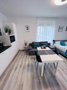 Posezení v ubytování Apartamenty Walczaka 26 MIEJSCE PARKINGOWE