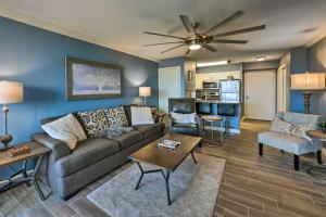 a living room with a couch and a table at Quaint Condo with Views and Pool Access! in Hot Springs