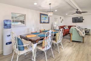 a dining room with a table and chairs at Pet-Friendly Cocoa Home with Covered Porch! in Cocoa