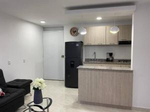 Η κουζίνα ή μικρή κουζίνα στο Acogedor Apartamento Como en casa +6 φωτογραφίες