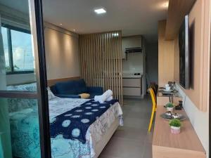 Postel nebo postele na pokoji v ubytování FLAT NOVO em Porto de Galinhas 100m da PRAIA + 25 fotografií