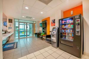 a waiting room with a soda machine in a hospital at Motel 6-Eagle Pass, TX - Lakeside in Eagle Pass