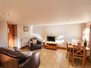 Et opholdsområde på Granary Cottage